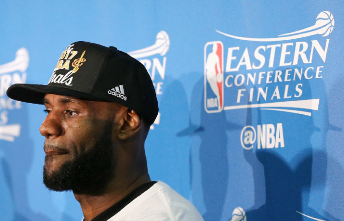 LeBron James No. 23 of the Cleveland Cavaliers looks on during the trophy presentation after Game Five of the 2017 NBA Eastern Conference Finals at TD Garden in Boston, Massachusetts. — AFP