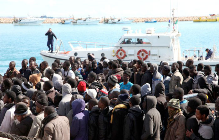 Migrants rescued in the Pozzallo harbor, Sicily, Italy. – AP
