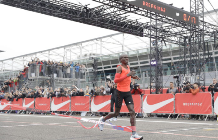 Olympic marathon champion Eliud Kipchoge crosses the finish line of a marathon race at the Monza Formula One racetrack, Italy in this May 6, 2017 file photo. — AP