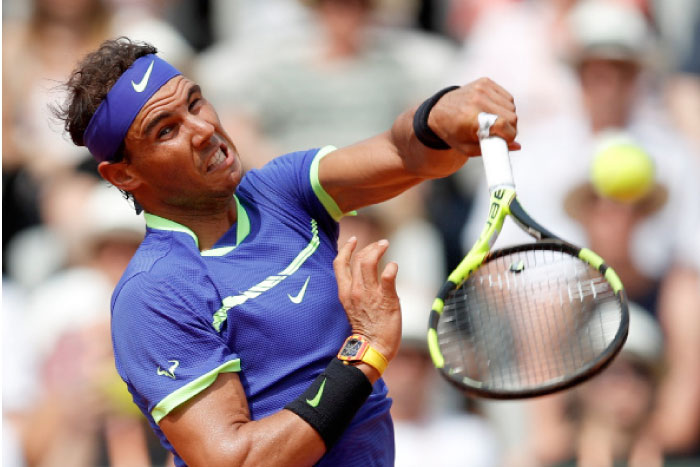 Spain's Rafael Nadal in action during his first round match against France's Benoit Paire at the French Open at Roland Garros in Paris. — Reuters