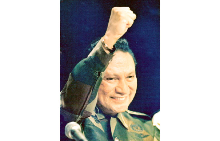 Manuel Noriega gestures while giving a speech in Panama City in this March 1988 file photo. — Reuters