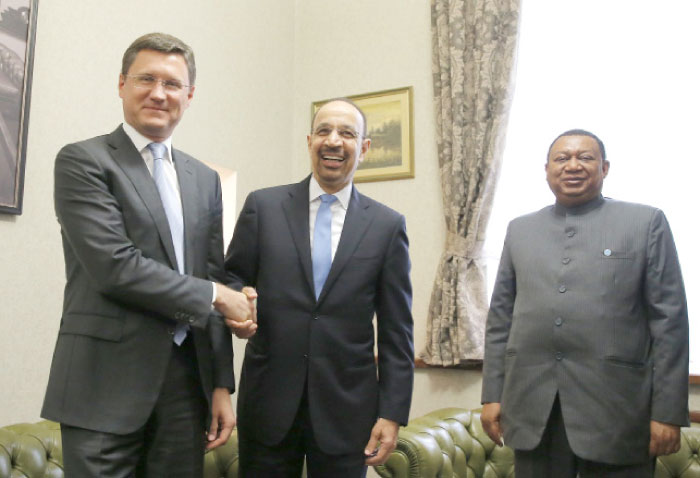 Saudi Arabian Energy Minister Khalid Al-Falih (center), Russian Energy Minister Alexander Novak (left), and OPEC Secretary General Mohammad Barkindo gather ahead of a meeting in Moscow. — Reuters