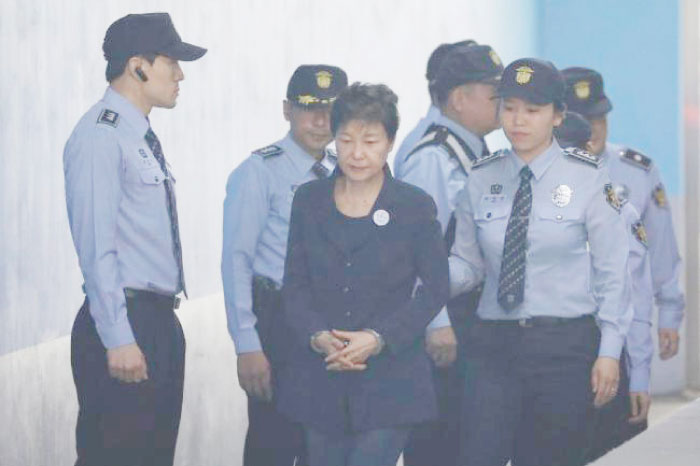South Korean ousted leader Park Geun-hye arrives at a court in Seoul on Tuesday. — AFP