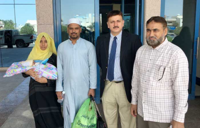 Hamid Abdullah and his wife with their newborn daughter and Abdul Basit Abbasi, consul for community welfare at the Pakistan Consulate General. — Courtesy photo