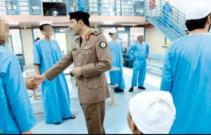 A senior police official shakes hands with released prisoners in Makkah. — SG photo by Badea Abu Al-Naja