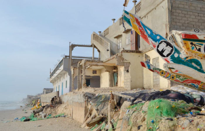 Damage caused by coastal erosion and rising sea levels in Guet Ndar district, in the northern city of Saint-Louis, Senegal.