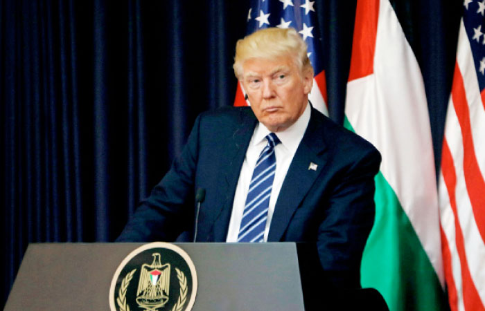 US President Donald Trump attends a joint news conference with Palestinian President Mahmoud Abbas (not pictured) at the presidential headquarters in the West Bank town of Bethlehem on Tuesday. — Reuters