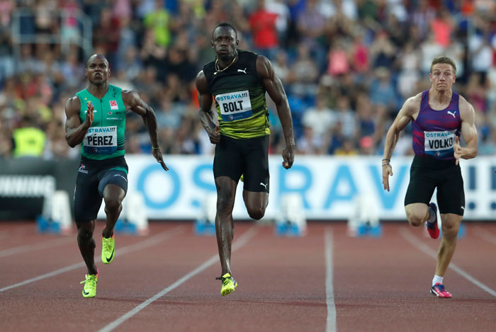 Usain Bolt from Jamaica (C) competes with Yunier Perez from Cuba (L) and Jan Volko from Slovakia to win the 100 meters event at the Golden Spike athletic meeting in Ostrava, Czech Republic, Wednesday. — AP