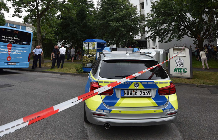 Police car stands in front of a residential building which was evacuated Tuesday in Wuppertal, Germany. German authorities evacuated a high-rise apartment building in the western city of Wuppertal, over fire safety fears in the wake of London's Grenfell Tower tragedy. — AFP