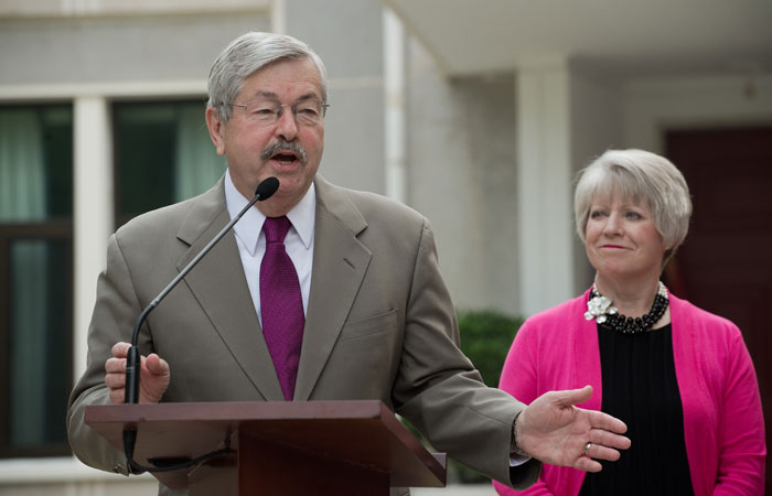 New US Ambassador to China Terry Branstad (L) speaks to the media next to his wife Christine (R) during a press conference at his residence in Beijing on Wednesday. — AFP