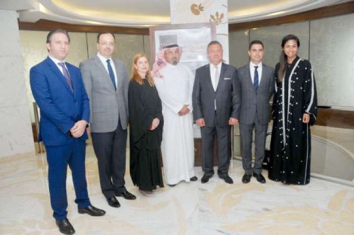 Turkish Swiss hotel representatives pose with Saudi GM of Swiss Hotel in Makkah