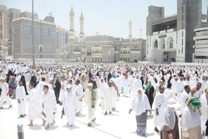 Umrah pilgrims and worshipers coming out of the Grand Mosque in Makkah on Sunday. — SG photo by Badea Abu Al-Naja