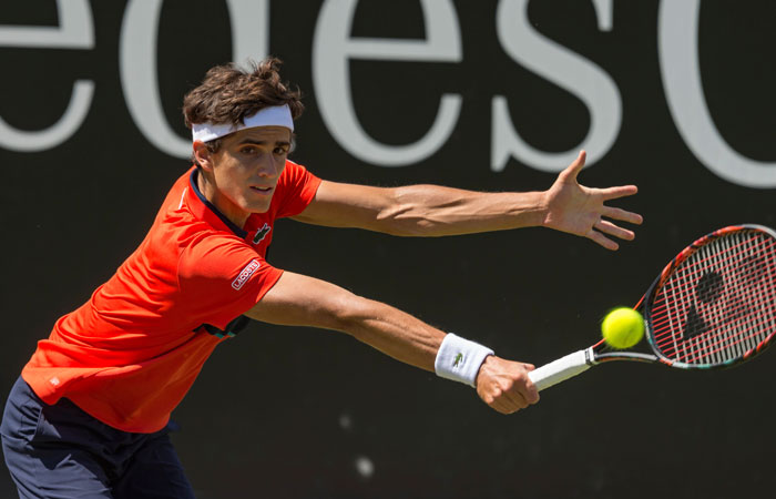 Pierre-Hugues Herbert from France returns the ball to Germany's Tommy Haas during their first round match of the Mercedes Cup tennis tournament in Stuttgart, Germany, Tuesday. — AP