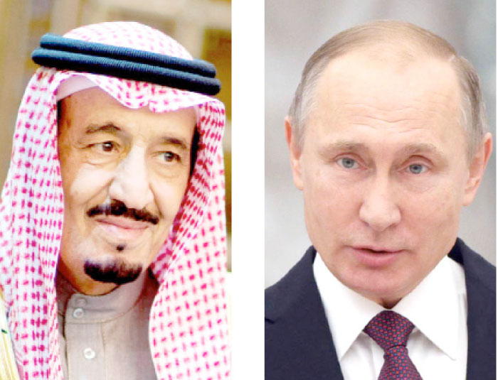 King Salman (L) and Vladimir Putin