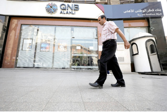 DUBAI — A move by four Arab states to blacklist dozens of figures with links to Qatar could squeeze liquidity at Qatari banks which get a significant amount of their funding from the region.   Qatari banks have around 60 billion riyals ($16 billion) in funding in the form of customer and interbank deposits from other Gulf states, Chiradeep Ghosh, banking analyst at SICO Bahrain, said.  But the United Arab Emirates central bank has ordered local banks to stop dealing with the 59 individuals and 12 entities with links to Qatar and to freeze their assets, state news agency WAM reported late on Friday.  It has also told them to apply enhanced due diligence for any accounts they hold with six Qatari banks, including Qatar National Bank (QNB) which is the Middle East and Africa’s largest bank, WAM said in its report  The six banks — QNB, Qatar Islamic Bank, Qatar International Islamic Bank, Barwa Bank, Masraf Al Rayan and Doha Bank — did not respond immediately to requests for comment.  Saudi Arabia, the UAE, Egypt and Bahrain had earlier branded as terrorists the same individuals, including Muslim Brotherhood spiritual leader Yousef Al-Qaradawi, and entities including Qatari-funded charities Qatar Charity and Eid Charity.  The move followed the isolation of Qatar by the four states, which have cut all diplomatic and transport links.  This pressure is likely to constrain the funding Qatari banks would be able to raise from Saudi Arabia, the UAE and Bahrain, one banker in the region told Reuters.  “All Qatari banks will struggle for liquidity and will have to pay a premium for funding from elsewhere outside these four countries,” SICO Bahrain’s Ghosh said.  “It is especially challenging as they’re not very liquid as their loan to deposit ratios are already above 100 percent,” Ghosh said.  In recent years several have also expanded outside Qatar’s small domestic market to grow their business, with QNB holding a presence in several countries including Egypt, Turkey, Nigeria and UAE either directly or via affiliates.  UAE banks would find it relatively easy to comply with the rules as many had invested in improving their compliance systems in recent years and already complied with sanctions against a range of other entities and individuals, another banker said. — Reuters