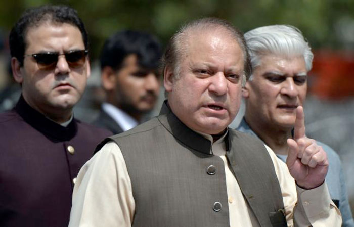 Pakistan's Prime Minister Nawaz Sharif speaks to media after appearing before an anti-corruption commission at the Federal Judicial Academy in Islamabad. — AFP