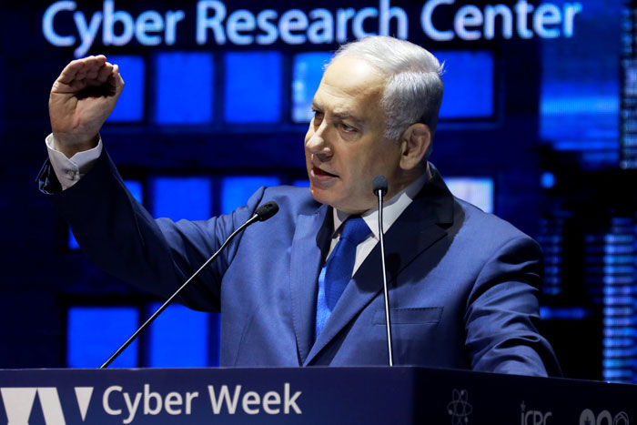 Israeli Prime Minister Benjamin Netanyahu speaks at a cyber security conference held at Tel Aviv University on Monday. — Reuters