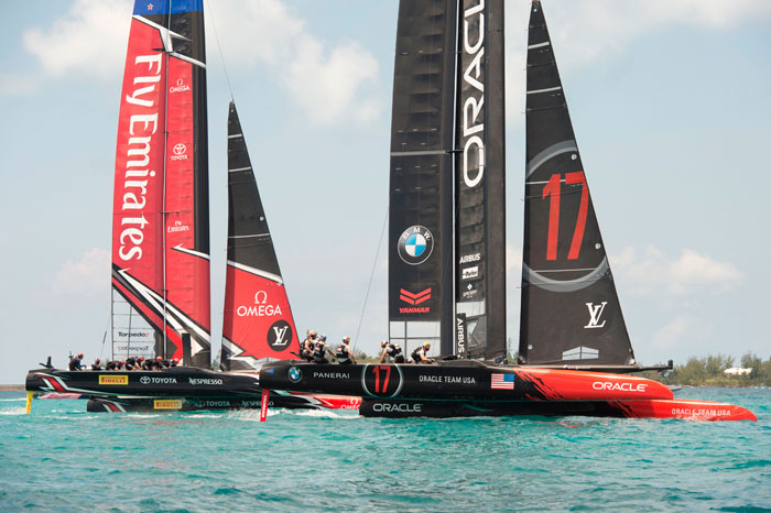 Emirates Team New Zealand forces a penalty on Oracle Team USA as they go over the start early during the 35th America's Cup in Hamilton, Bermuda, Sunday. — AFP