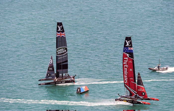 In this photo provided by America's Cup Event Authority, Emirates Team New Zealand and Great Britain's Land Rover BAR compete during America's Cup challenger semifinals on the Great Sound in Bermuda on Monday. — AP