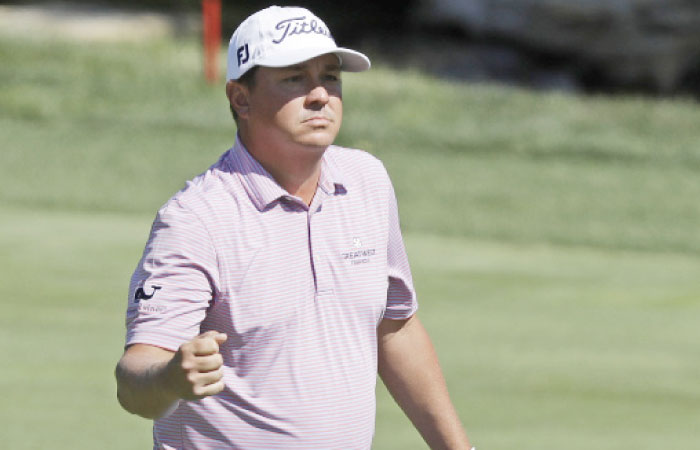 Jason Dufner reacts after an eagle on the 18th hole during the second round of the Memorial Golf Tournament in Dublin, Ohio, Friday. — AP