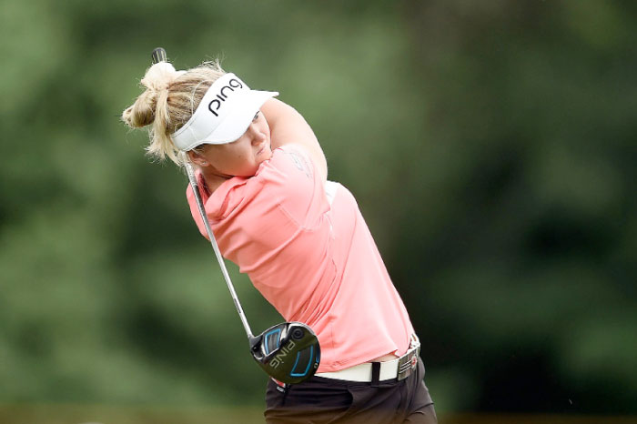 Henderson of Canada hits her tee shot on the sixth hole during the second round of the Meijer LPGA Classic at Blythefield Country Club in Grand Rapids, Michigan, Friday. — AFP