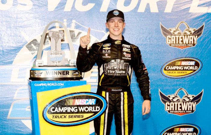 John Hunter Nemechek, driver of the #8 Chevrolet Silverado poses for a photo after winning the NASCAR Camping World Trucks Series Drivin’ for Linemen 200 at Gateway Motorsports Park in Madison, Illinois, Saturday. — AFP