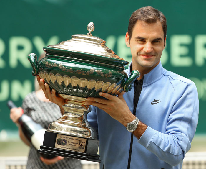 Switzerland's Roger Federer celebrates his victory after the final against Germany's Alexander Zverev at the Gerry Weber Open Tennis Tournament in Halle, Germany, Sunday. — AP