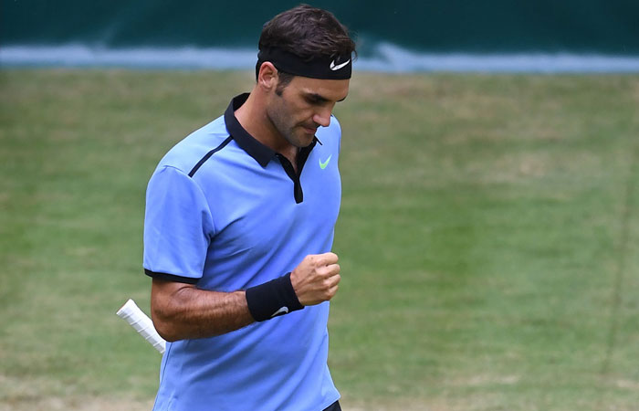 Switzerland's Roger Federer reacts during his match against Germany's Mischa Zverev at the ATP Tennis Tournament in Halle, Germany, Thursday. — AFP