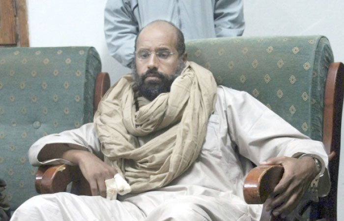 In this Nov. 19, 2011, file photo, Saif Al-Islam is seen after his capture in the custody of fighters in Zintan, a town south of the capital Tripoli, Libya. — AP