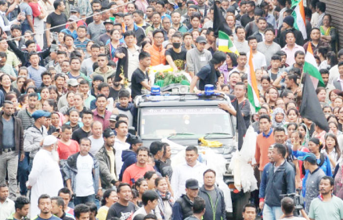 Indian supporters of the separatist Gorkha Janmukti Morcha (GJM) group take part in a rally with the bodies of protesters that GJM leaders say had been killed during clashes with security forces a day earlier, in Darjeeling, India, on Sunday. — AFP