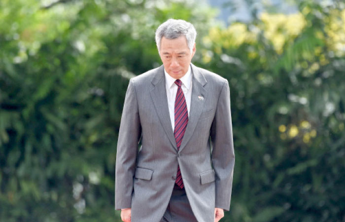 This photograph taken on June 2, 2017 shows Singapore Prime Minister Lee Hsien Loong at an event at the Istana presidential palace in Singapore. — AFP