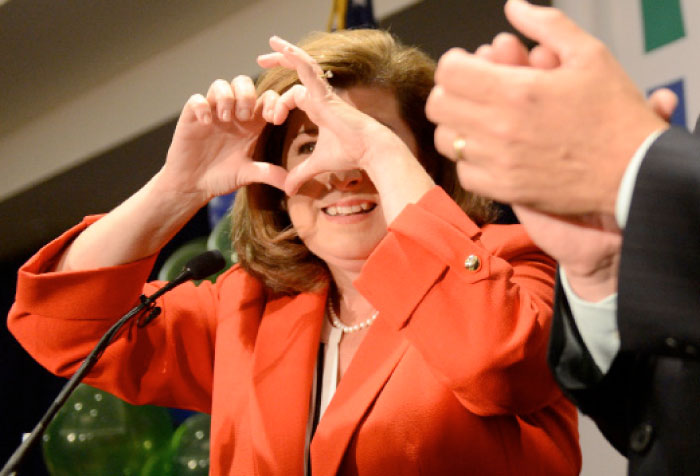 Karen Handel, Republican candidate for Georgia’s 6th Congressional District, makes a heart with her fingers as she speaks to supporters during a brief appearance at her election night party at the Hyatt Regency at Villa Christina in Atlanta, Georgia, on Tuesday. — Reuters