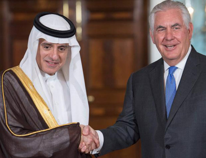 US Secretary of State Rex Tillerson(R) shake hands with Saudi Foreign Minister Adel Al-Jubeir Tuesday, shortly before their private meeting at the US Department of State in Washington, DC. — AFP