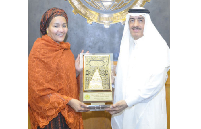 United Nations Deputy Secretary-General Amina Mohammed receives a plaque of appreciation from IDB Group President Dr. Bandar Hajjar at IDB Group headquarters