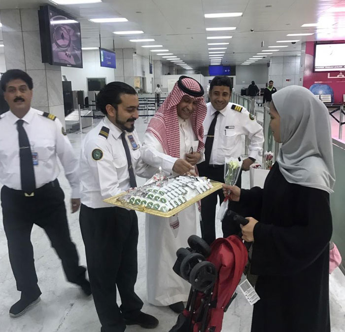 Customs officers celebrate Eid with passengers