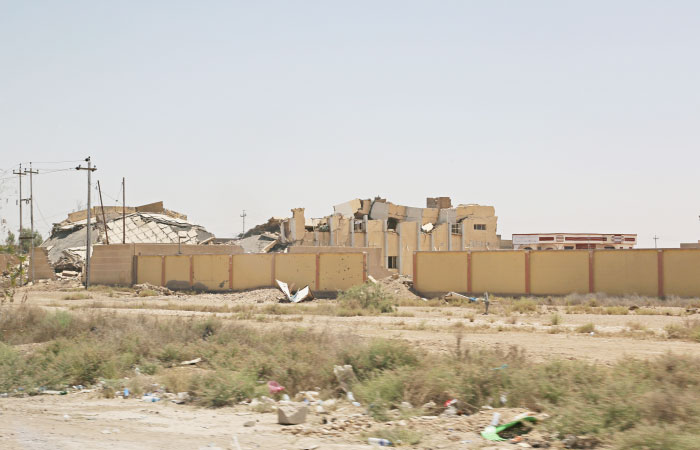 Destroyed buildings are seen in Falluja, Iraq. Residents of Falluja are still struggling to rebuild nearly a year after their neighborhoods were declared liberated from the Daesh group. — AP