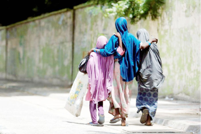 A group of girls is seen walking in Yola, Nigeria. — Reuters