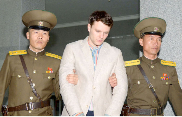 Otto Frederick Warmbier, center, a University of Virginia student who was detained in North Korea since early January, is taken to North Korea’s top court in Pyongyang, North Korea, in this file photo. — Reuters