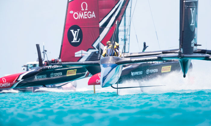 Emirates Team New Zealand (R) skippered by Peter Burling races on Bermuda’s Great Sound. — AFP