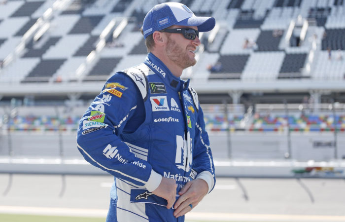 Dale Earnhardt Jr., driver of the #88 Nationwide Chevrolet, stands on the grid during qualifying for the Monster Energy Nascar Cup Series at Daytona International Speedway Friday. — AFP