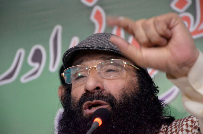 Syed Salahuddin, supreme commander of Hizbul Mujahideen, speaks at a news conference in Muzaffarabad, Pakistan, on Saturday. — Reuters